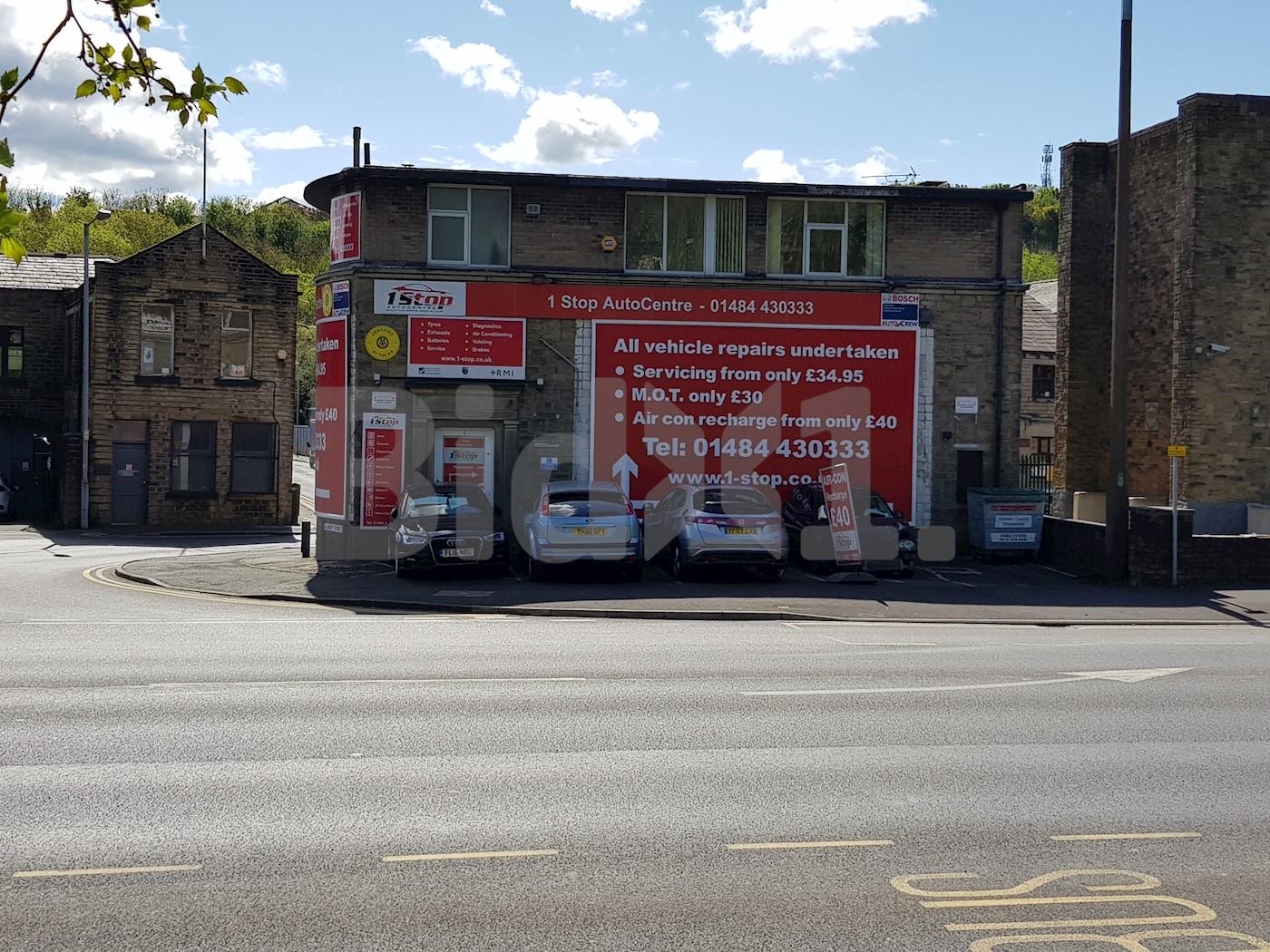 Advertising hoardings on gable walls, Lockwood Road, Huddersfield, HD1 3PJ 1/3